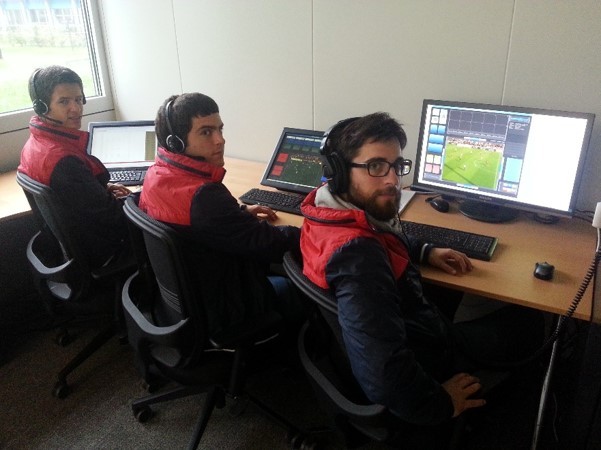 Three XD Broadcast engineers monitoring live match feeds on headphones